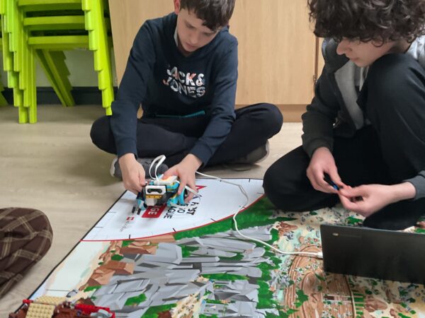 Learners aged 9–16 from Allerthorpe School building LEGO® robots during weekly FIRST® LEGO® League sessions.