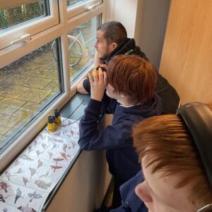 Outdoor learning at Allerthorpe SEN School as learners observe and record birds for the National Bird Count.
